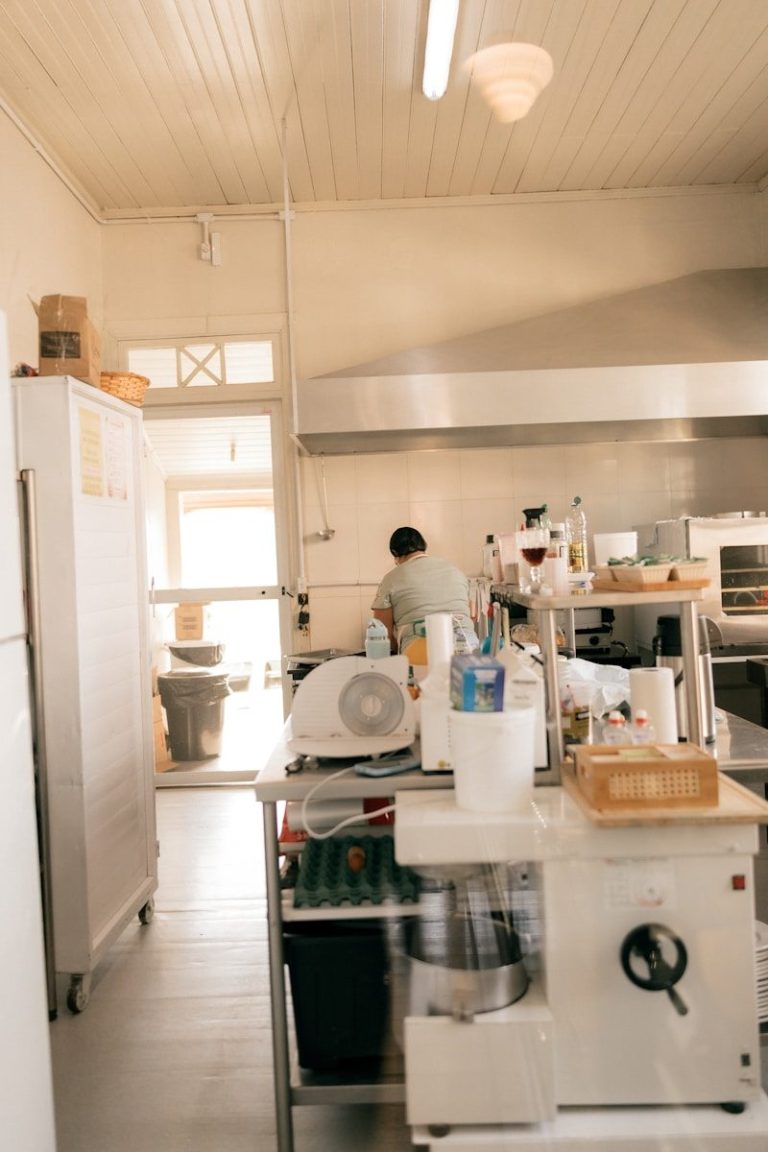 A person working in a commercial kitchen.